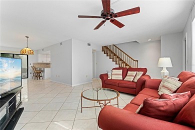 STUNNING WATERFRONT TOWNHOME IN PGI W/DEEDED DOCK - Discover the on Saint Andrews South Golf Club in Florida - for sale on GolfHomes.com, golf home, golf lot
