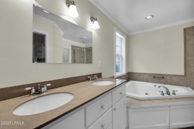 Welcome to this charming ranch-style home on Lady's Island on Ladys Island Country Club in South Carolina - for sale on GolfHomes.com, golf home, golf lot
