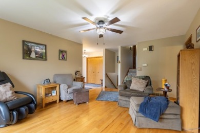 This is a home that checks all the boxes. Inside is a large well on Merrill Golf Club in Wisconsin - for sale on GolfHomes.com, golf home, golf lot