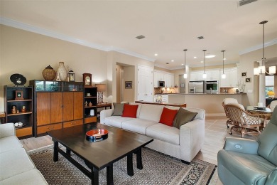This pristine, expanded Hampton shows pride in ownership at on Eagle Ridge At Spruce Creek Country Club in Florida - for sale on GolfHomes.com, golf home, golf lot