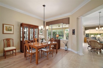 This pristine, expanded Hampton shows pride in ownership at on Eagle Ridge At Spruce Creek Country Club in Florida - for sale on GolfHomes.com, golf home, golf lot