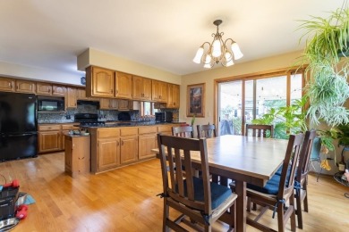 This is a home that checks all the boxes. Inside is a large well on Merrill Golf Club in Wisconsin - for sale on GolfHomes.com, golf home, golf lot