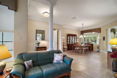 This pristine, expanded Hampton shows pride in ownership at on Eagle Ridge At Spruce Creek Country Club in Florida - for sale on GolfHomes.com, golf home, golf lot