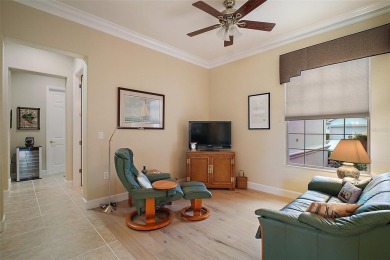 This pristine, expanded Hampton shows pride in ownership at on Eagle Ridge At Spruce Creek Country Club in Florida - for sale on GolfHomes.com, golf home, golf lot