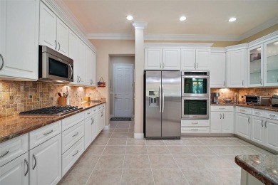 This pristine, expanded Hampton shows pride in ownership at on Eagle Ridge At Spruce Creek Country Club in Florida - for sale on GolfHomes.com, golf home, golf lot