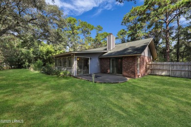 Welcome to this charming ranch-style home on Lady's Island on Ladys Island Country Club in South Carolina - for sale on GolfHomes.com, golf home, golf lot