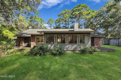 Welcome to this charming ranch-style home on Lady's Island on Ladys Island Country Club in South Carolina - for sale on GolfHomes.com, golf home, golf lot