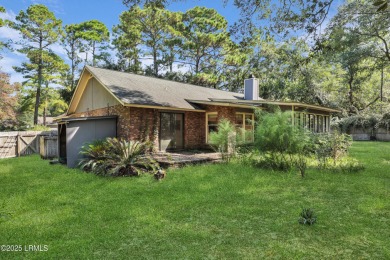 Welcome to this charming ranch-style home on Lady's Island on Ladys Island Country Club in South Carolina - for sale on GolfHomes.com, golf home, golf lot