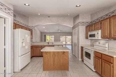 Just steps from the clubhouse, this expanded Palmera Model in on Oakwood Golf Club  in Arizona - for sale on GolfHomes.com, golf home, golf lot