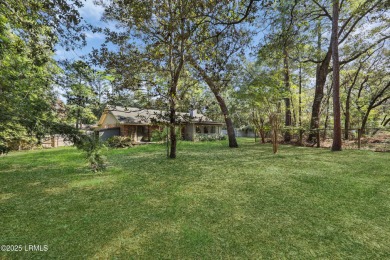 Welcome to this charming ranch-style home on Lady's Island on Ladys Island Country Club in South Carolina - for sale on GolfHomes.com, golf home, golf lot