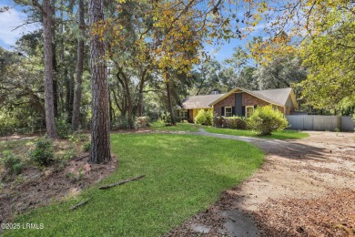 Welcome to this charming ranch-style home on Lady's Island on Ladys Island Country Club in South Carolina - for sale on GolfHomes.com, golf home, golf lot