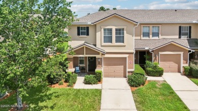 Enjoy low-maintenance living in this end unit two-story townhome on Golf Club At Fleming Island in Florida - for sale on GolfHomes.com, golf home, golf lot