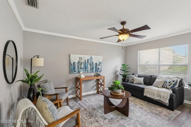 Enjoy low-maintenance living in this end unit two-story townhome on Golf Club At Fleming Island in Florida - for sale on GolfHomes.com, golf home, golf lot