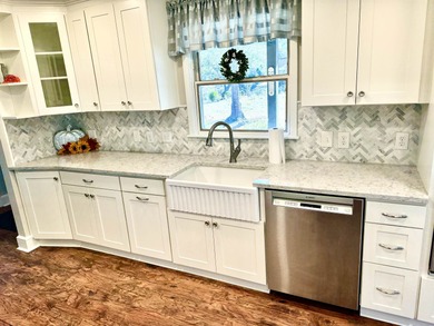 Experience unparalleled waterfront living in beautiful on Wedgefield Plantation Golf Club in South Carolina - for sale on GolfHomes.com, golf home, golf lot