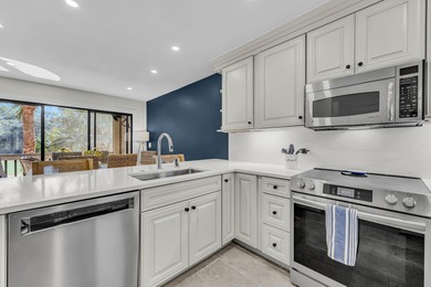 A thoughtfully renovated two-level villa with elevated living on The Seabrook Island Club in South Carolina - for sale on GolfHomes.com, golf home, golf lot