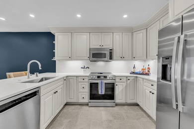 A thoughtfully renovated two-level villa with elevated living on The Seabrook Island Club in South Carolina - for sale on GolfHomes.com, golf home, golf lot