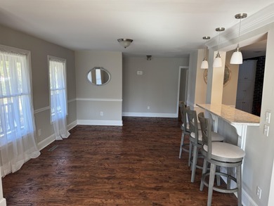 Experience unparalleled waterfront living in beautiful on Wedgefield Plantation Golf Club in South Carolina - for sale on GolfHomes.com, golf home, golf lot