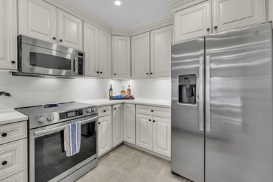 A thoughtfully renovated two-level villa with elevated living on The Seabrook Island Club in South Carolina - for sale on GolfHomes.com, golf home, golf lot