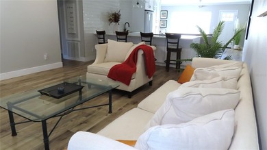 A move-in ready, beautifully remodeled, ground floor unit is on On Top Of The World Golf Course in Florida - for sale on GolfHomes.com, golf home, golf lot