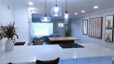 A move-in ready, beautifully remodeled, ground floor unit is on On Top Of The World Golf Course in Florida - for sale on GolfHomes.com, golf home, golf lot