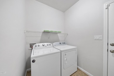 This beautifully updated 5-bedroom, 3-bathroom home offers a on The Neuse Golf Club in North Carolina - for sale on GolfHomes.com, golf home, golf lot