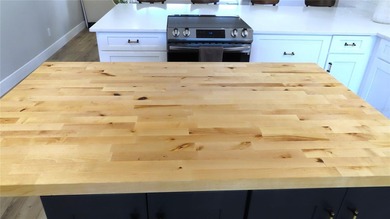 A move-in ready, beautifully remodeled, ground floor unit is on On Top Of The World Golf Course in Florida - for sale on GolfHomes.com, golf home, golf lot