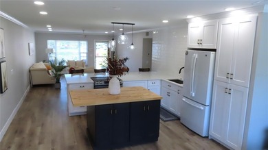 A move-in ready, beautifully remodeled, ground floor unit is on On Top Of The World Golf Course in Florida - for sale on GolfHomes.com, golf home, golf lot