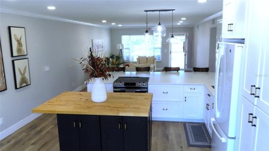 A move-in ready, beautifully remodeled, ground floor unit is on On Top Of The World Golf Course in Florida - for sale on GolfHomes.com, golf home, golf lot