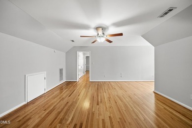 This beautifully updated 5-bedroom, 3-bathroom home offers a on The Neuse Golf Club in North Carolina - for sale on GolfHomes.com, golf home, golf lot