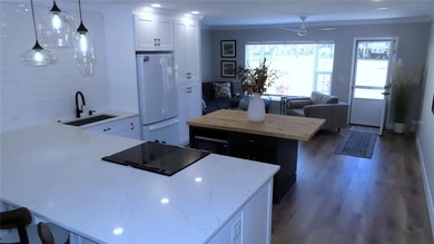 A move-in ready, beautifully remodeled, ground floor unit is on On Top Of The World Golf Course in Florida - for sale on GolfHomes.com, golf home, golf lot