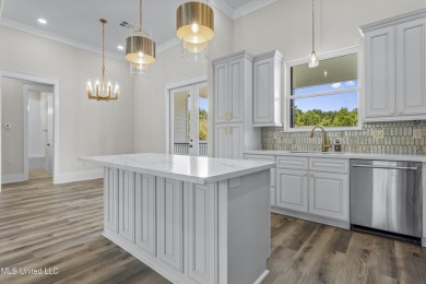 Welcome to this beautifully crafted 3-bedroom, 3-bath home in on The Bridges Golf Club At Hollywood Casino in Mississippi - for sale on GolfHomes.com, golf home, golf lot