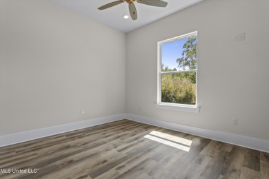 Welcome to this beautifully crafted 3-bedroom, 3-bath home in on The Bridges Golf Club At Hollywood Casino in Mississippi - for sale on GolfHomes.com, golf home, golf lot