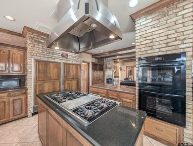 Welcome to Hollytree living in this  4BR/3BA estate spanning on Hollytree Country Club in Texas - for sale on GolfHomes.com, golf home, golf lot