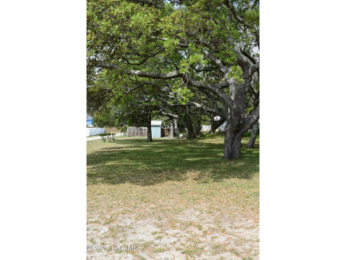 Great lot ready for you to build your dream home. Surrounded by on Brick Landing Plantation Yacht and Golf Club in North Carolina - for sale on GolfHomes.com, golf home, golf lot