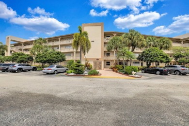 Spacious 2 bed, 2 bath condo in the popular Wynmoor community on Wynmoor Golf Course in Florida - for sale on GolfHomes.com, golf home, golf lot