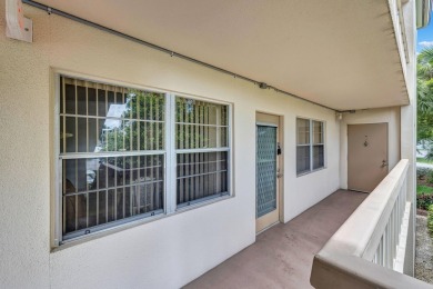 Spacious 2 bed, 2 bath condo in the popular Wynmoor community on Wynmoor Golf Course in Florida - for sale on GolfHomes.com, golf home, golf lot