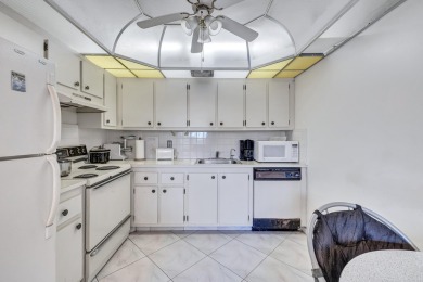 Spacious 2 bed, 2 bath condo in the popular Wynmoor community on Wynmoor Golf Course in Florida - for sale on GolfHomes.com, golf home, golf lot