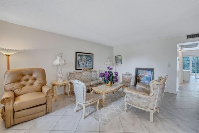 Spacious 2 bed, 2 bath condo in the popular Wynmoor community on Wynmoor Golf Course in Florida - for sale on GolfHomes.com, golf home, golf lot