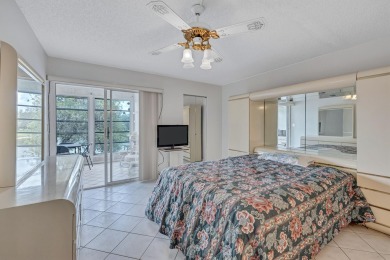 Spacious 2 bed, 2 bath condo in the popular Wynmoor community on Wynmoor Golf Course in Florida - for sale on GolfHomes.com, golf home, golf lot