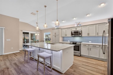 STUNNING, BLOCK and STUCCO 3/2 IRIS with GLASS ENCLOSED on Pennbrooke Fairways in Florida - for sale on GolfHomes.com, golf home, golf lot