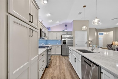 STUNNING, BLOCK and STUCCO 3/2 IRIS with GLASS ENCLOSED on Pennbrooke Fairways in Florida - for sale on GolfHomes.com, golf home, golf lot