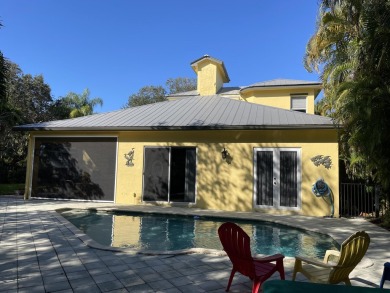 Enjoy Key West Style; Spacious home situated along the on Loblolly Golf Club in Florida - for sale on GolfHomes.com, golf home, golf lot