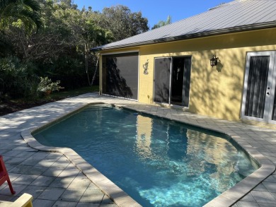 Enjoy Key West Style; Spacious home situated along the on Loblolly Golf Club in Florida - for sale on GolfHomes.com, golf home, golf lot