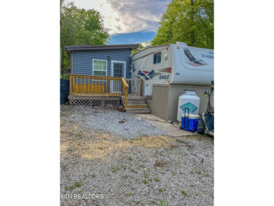 Price improvement!  Motivated sellers!  YOU OWN THE LOT!!  With on Lake Tansi Village Country Club in Tennessee - for sale on GolfHomes.com, golf home, golf lot