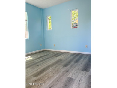 Price improvement!  Motivated sellers!  YOU OWN THE LOT!!  With on Lake Tansi Village Country Club in Tennessee - for sale on GolfHomes.com, golf home, golf lot