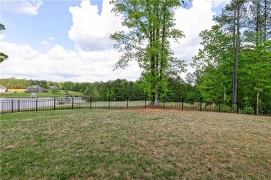 Welcome to 8694 St Andrews Parkway, a stunning step-less ranch on St. Andrews Golf and Country Club in Georgia - for sale on GolfHomes.com, golf home, golf lot
