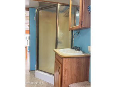 Price improvement!  Motivated sellers!  YOU OWN THE LOT!!  With on Lake Tansi Village Country Club in Tennessee - for sale on GolfHomes.com, golf home, golf lot