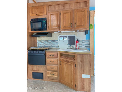 Price improvement!  Motivated sellers!  YOU OWN THE LOT!!  With on Lake Tansi Village Country Club in Tennessee - for sale on GolfHomes.com, golf home, golf lot