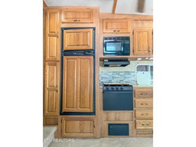 Price improvement!  Motivated sellers!  YOU OWN THE LOT!!  With on Lake Tansi Village Country Club in Tennessee - for sale on GolfHomes.com, golf home, golf lot
