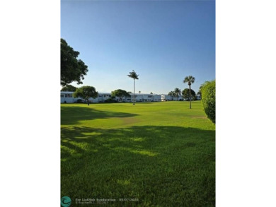 Beautiful Leisureville Condo 55+ community. 1st Floor No Land on Leisureville Community Association in Florida - for sale on GolfHomes.com, golf home, golf lot